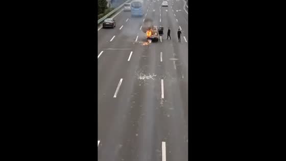 Explosion erupts as people battle truck fire on highway in Shanghai, China