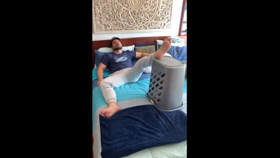 Father falls asleep with child trapped in laundry bucket