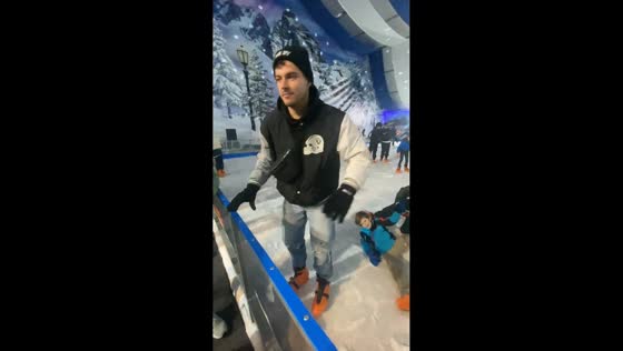 Father and son slip and fall on ice skating rink in Gijón, Spain
