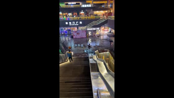 Man slides past bottom of wet slide and keeps going in Zhejiang, China