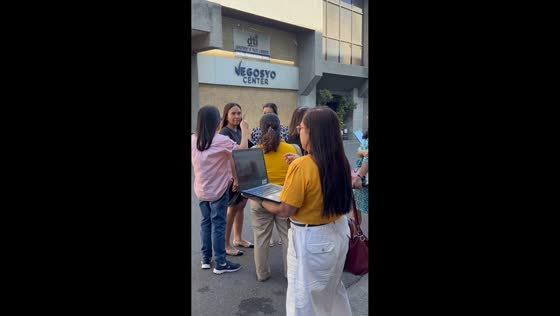 Woman continues work call after evacuation during earthquake in Cebu, Philippines