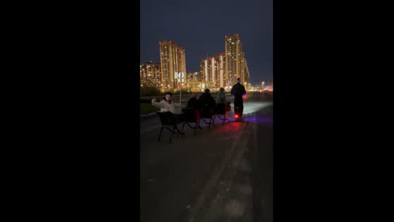 Modified electric scooter pulls four-person cart in St. Petersburg