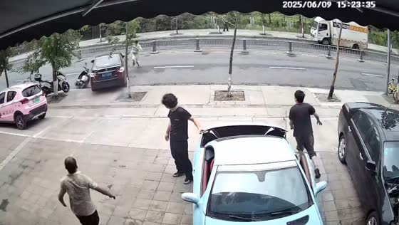 Car nearly hits bystander and crashes into motorcycle in Sichuan, China