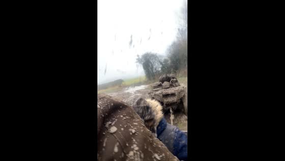 Friends enjoy muddy adventure while towing quad bike in Leicester, England, UK