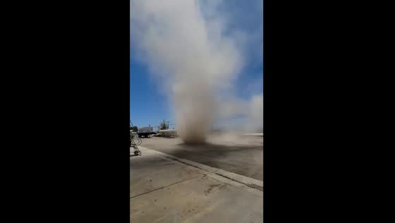 Dust devil rips through shop in Adelanto, California