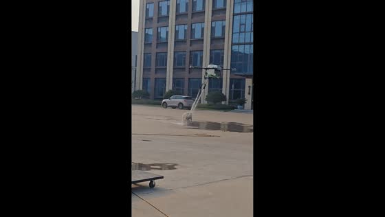 Dog gets showered by a water-spraying drone in Shandong, China