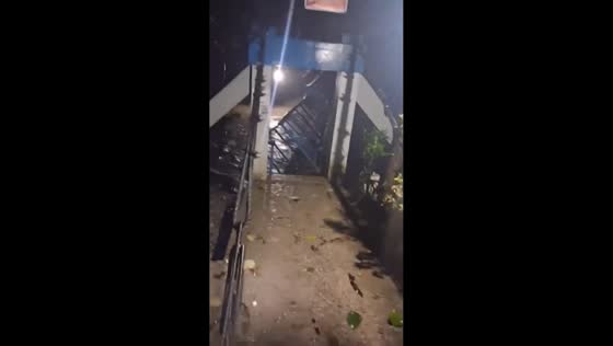 Bridge collapses during storm flooding in Iligan, Philippines