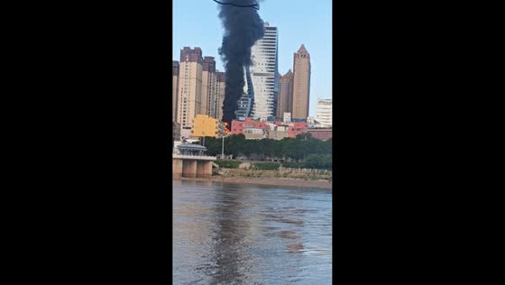 Large fire sends thick black smoke across skyline in Lanzhou, China