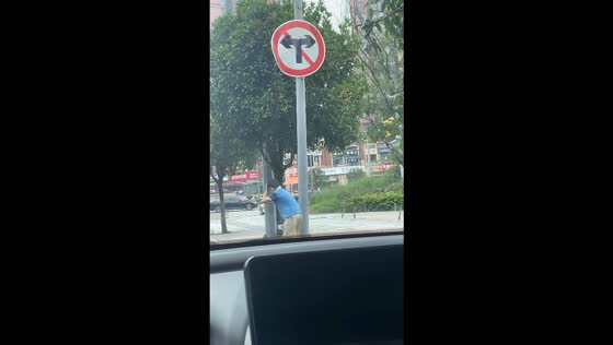 Boy accidentally gets hit on the head by a water bottle in Sichuan, China