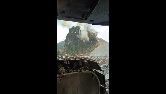 Fascinating controlled explosion on a small hill in Guangxi, China
