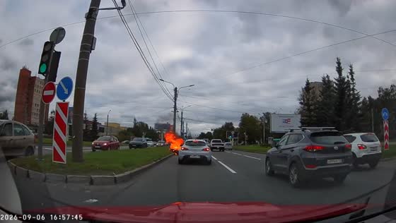 Motorcyclist catches fire after losing control in serious crash in St. Petersburg, Russia