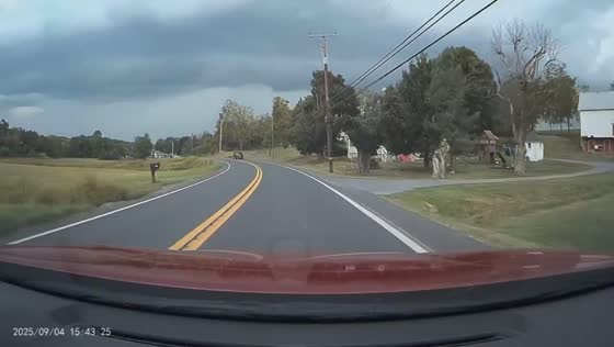 Driving toward dark storm clouds in Germansville, Pennsylvania
