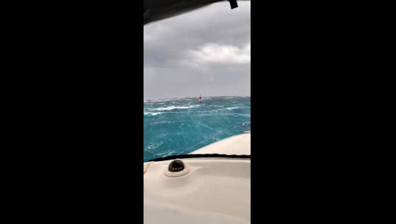 Boat in distress during storm in Formentera