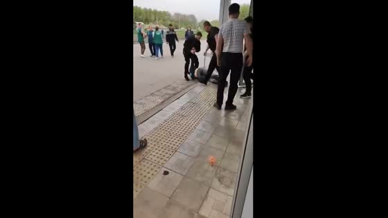 Russian police drag 24-year-old out of grocery store after arson