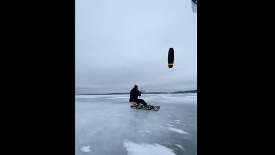 Kite surfer glides on ice in Pereslavl-Zalessky