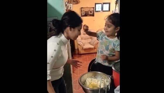 Child breaks egg on woman's face in Santiago after playful challenge