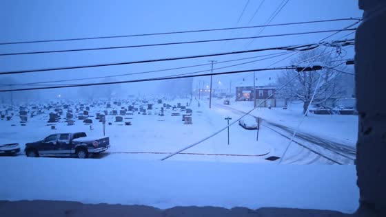 Thick snowfall blankets neighborhood in Brackenridge, Pennsylvania, USA
