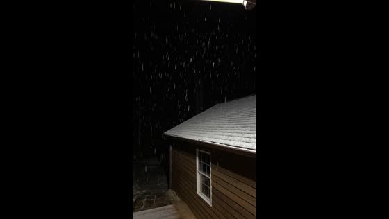 Heavy snowfall blankets high elevations in Haywood, North Carolina, USA
