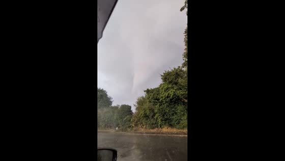 Tornado-like funnel spotted through heavy rain in Redbourn, UK