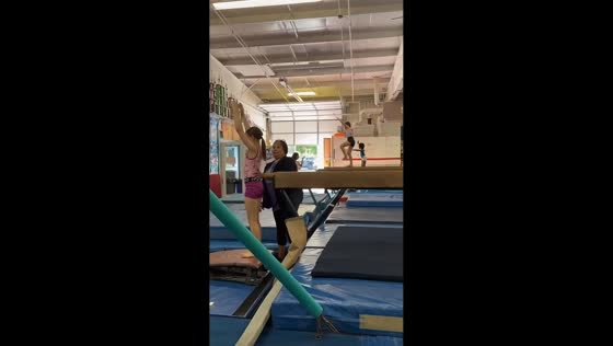 Young gymnast has close call during balance beam practice in Edison, New Jersey, USA