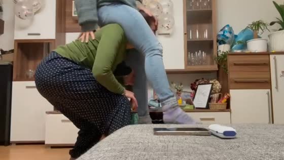 Playful shoulder-carry attempt ends in funny fall in Waren, Germany