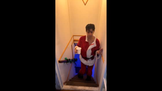 Drunk guy in Santa costume trips and falls down stairs in Lubbock City, Texas, USA