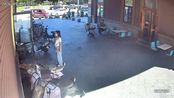Pastries slide off rack and spill onto ground outside store in Liaoning, China