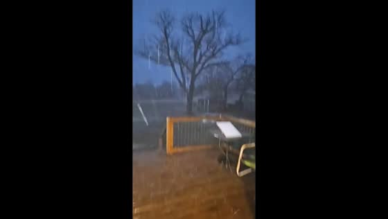Hail falls during evening storm in Tow, Texas, USA