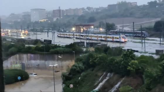 Severe flooding leaves cars stranded and rail yard submerged in Granollers, Spain
