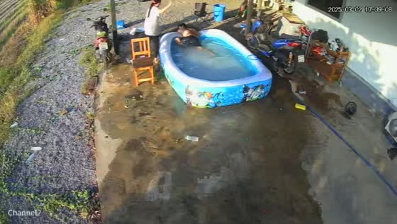 Playful moment as wife jokingly scares husband and son in Khlong Luang, Thailand
