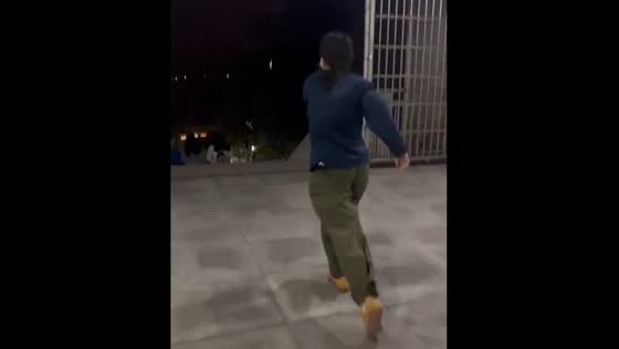Person struggles to walk against strong wind in Sichuan