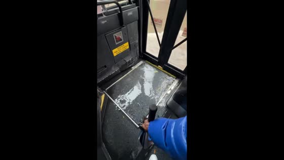 Floodwaters pour into bus after heavy rainfall in New York, USA