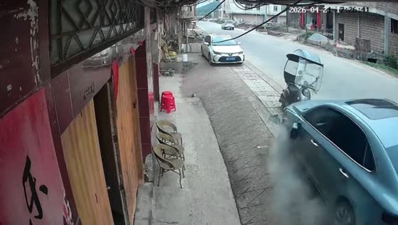 Car crashes into parked motorcycle in Guangxi, China