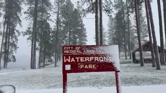 Heavy snowfall blankets Medical Lake Waterfront Park, Washington, USA