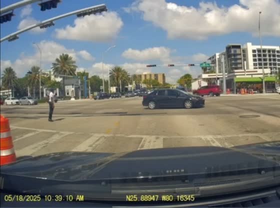 Scooter rider hit by red light runner in North Miami Beach, Florida, USA
