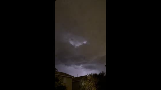 Thunderstorm builds with dark clouds and lightning in Las Vegas, Nevada, USA