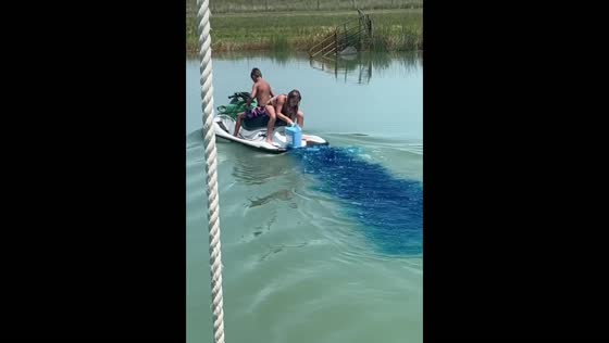 Pond dyed blue in Stapleton, Nebraska to inhibit algae growth