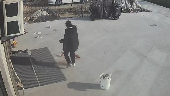 Brick narrowly misses woman in Anhui, China