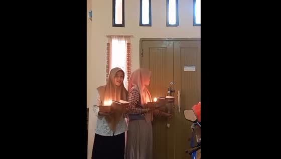 The girl accidentally set her handkerchief on fire while preparing a surprise for a friend!