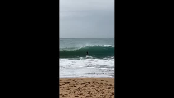 Man attempts to surf but fails in Cádiz, Spain