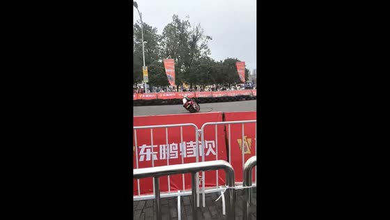 Motorcycle rider crashes during racing demonstration at expo in Chongqing, China
