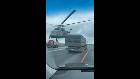 Military aircraft flies dangerously low over road in Kursk Region, Russia