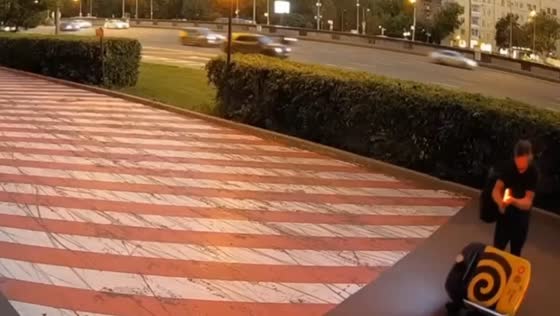 Drunken man attacks Yandex delivery robot in Moscow, Russia