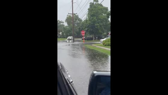 Roads submerged by flash flooding in East Islip, New York, USA