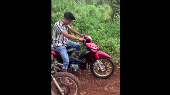Rider veers off track during cross race in Bengkulu, Indonesia