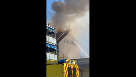 Heavy smoke rises from apartment roof fire in Winterthur, Switzerland