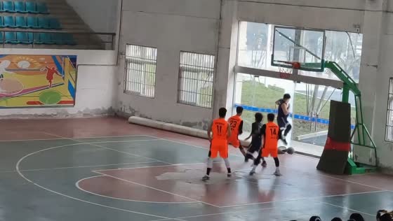 Basketball player crashes through glass door chasing loose ball in Anhui, China