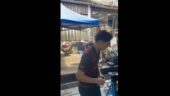 Man falls backwards from chair in Seremban, Malaysia