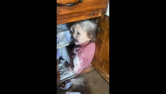 Toddler gets covered in flour inside cabinet in Buenos Aires, Argentina