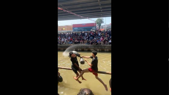 Pillow hitting competition over water in Indonesia